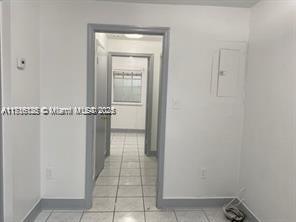 2633 Southwest 34th Avenue Miami, FL 33133 - Photo 11 of 16 a view of a closet in a room