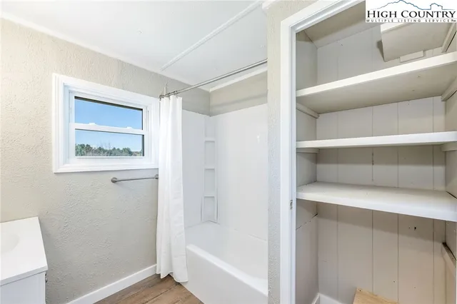 a bathroom with a bathtub