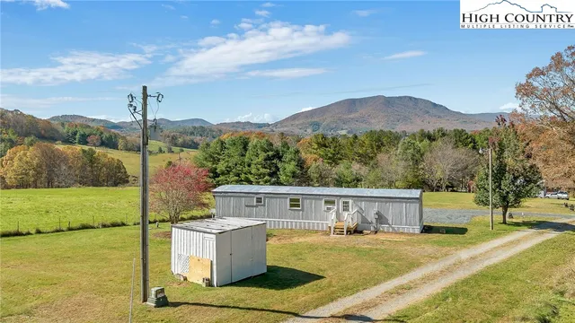 a view of a house with a ocean view