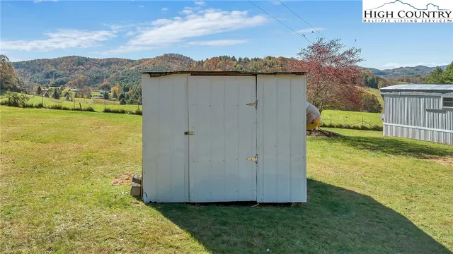 a view of a yard with an outdoor space