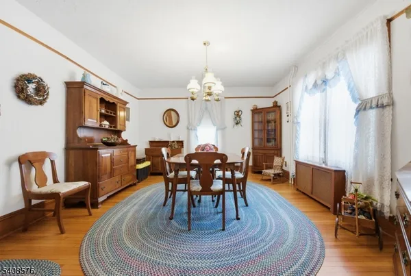a living room with furniture or couch and a large window