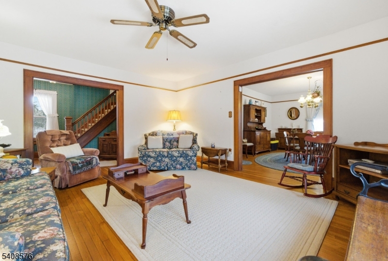 203 Johnsonburg Road Andover, NJ 07821 - Photo 23 of 42 a living room with furniture and wooden floor