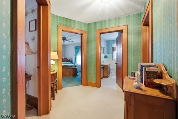 a bedroom with bed and window