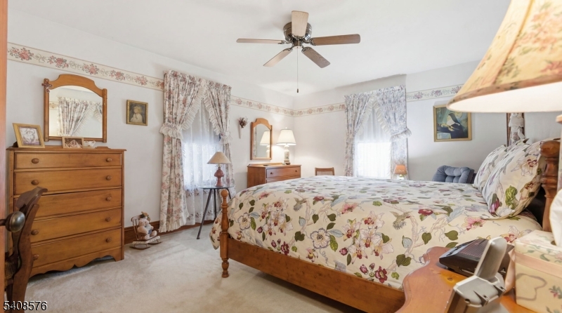 203 Johnsonburg Road Andover, NJ 07821 - Photo 26 of 42 a bedroom with a bed and a dresser