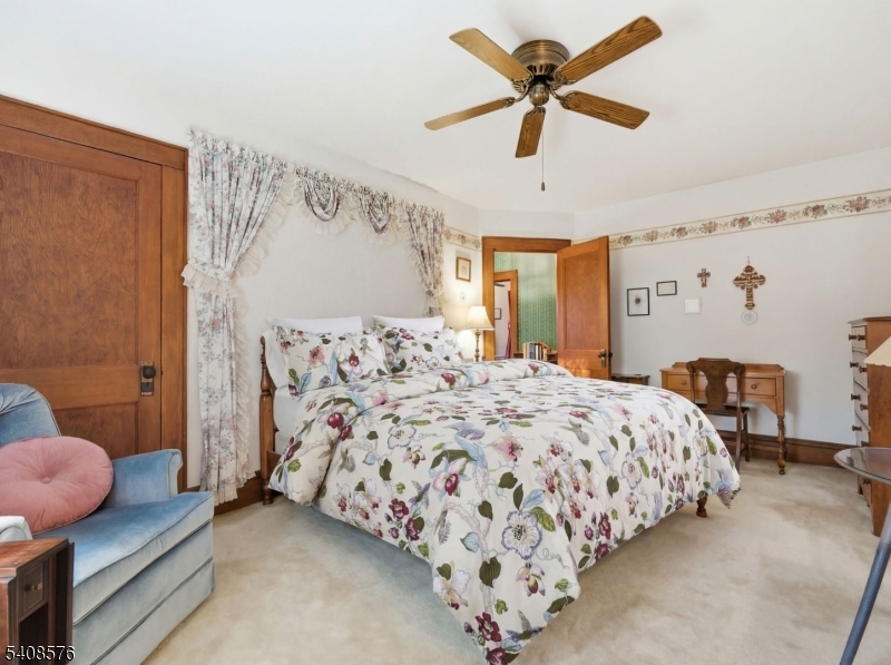 203 Johnsonburg Road Andover, NJ 07821 - Photo 27 of 42 a bedroom with bed and window