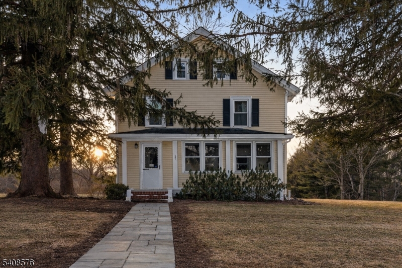 203 Johnsonburg Road Andover, NJ 07821 - Photo 3 of 42 a front view of house with yard and trees
