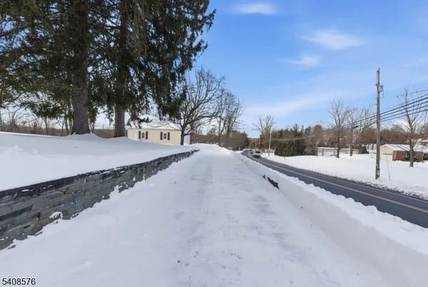 a view of a house with a snow