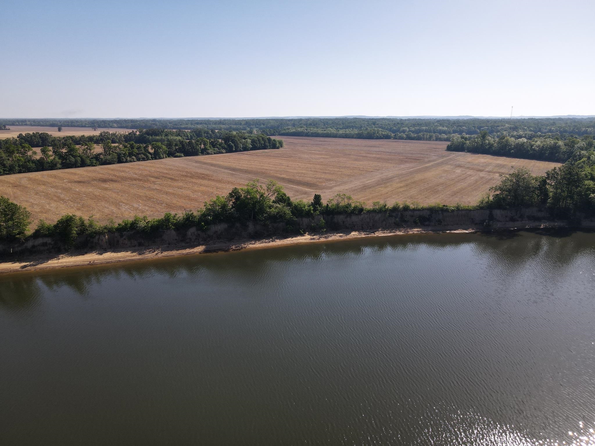 859 Cravens Road Savannah, TN 38372 - Photo 34 of 40 an aerial view of residential building and lake
