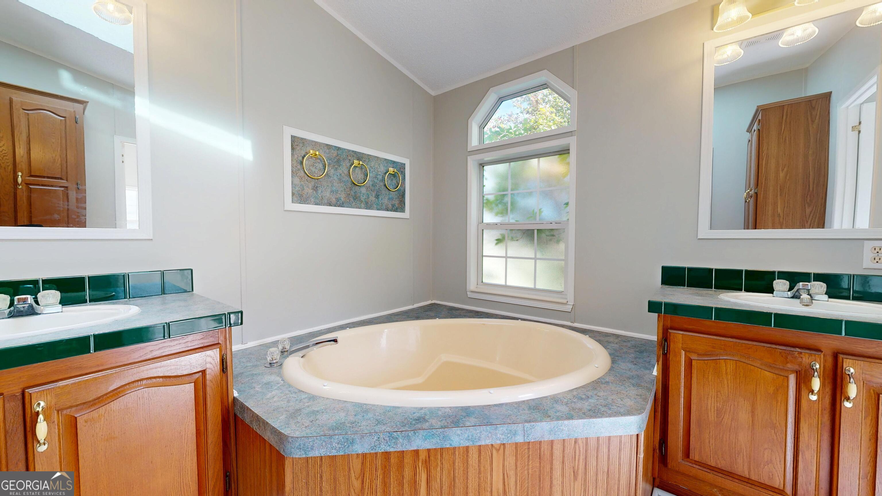 6498 Central Avenue Waycross, GA 31503 - Photo 7 of 20 a view of a kitchen that has a sink and a window
