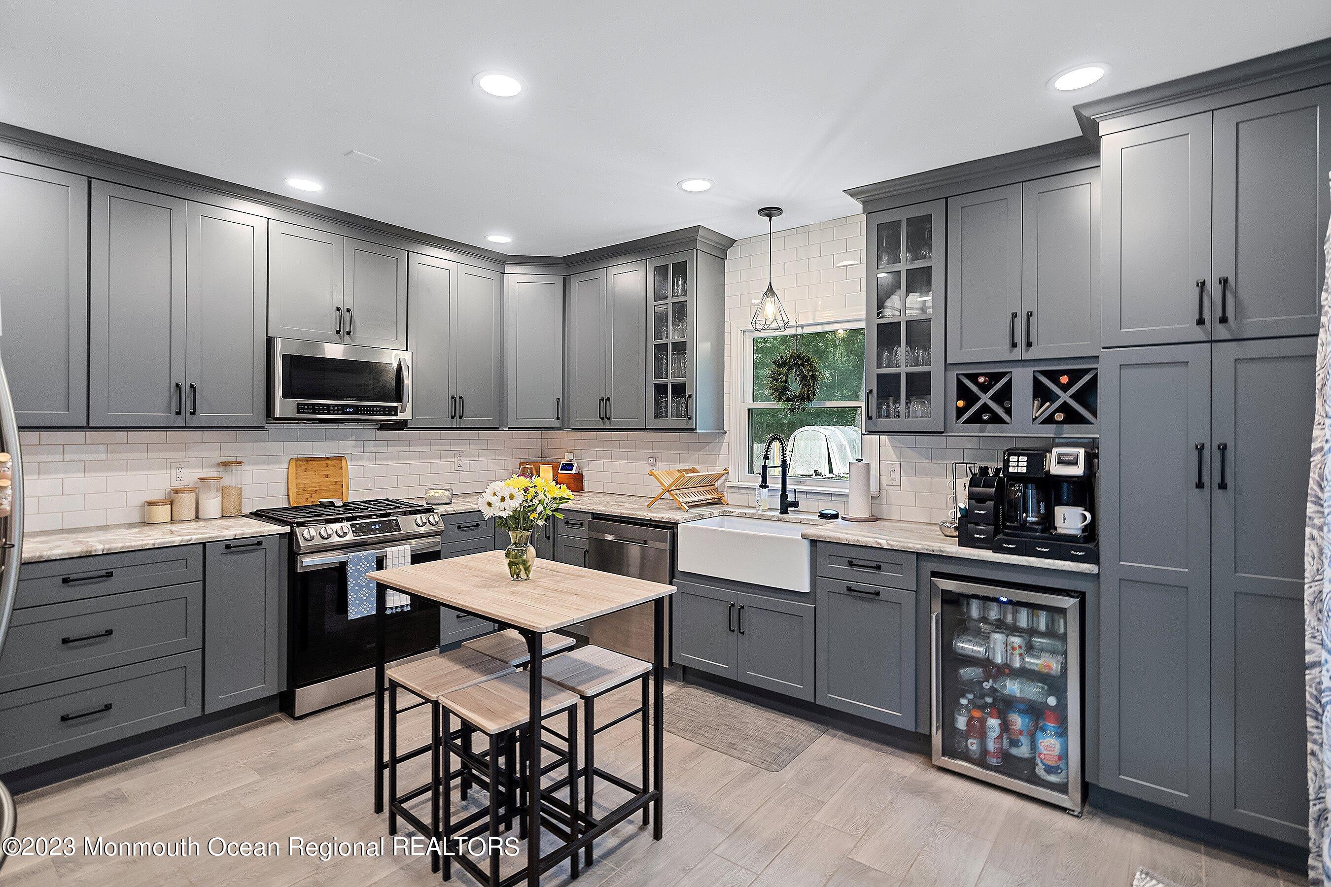 17 Murdock Place Jackson, NJ 08527 - Photo 1 of 34 a kitchen with stainless steel appliances granite countertop a stove top oven a sink dishwasher and a refrigerator