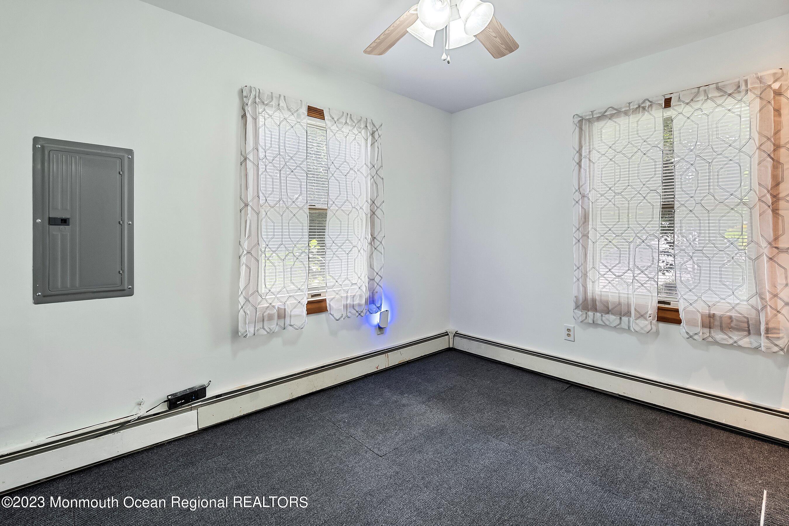 17 Murdock Place Jackson, NJ 08527 - Photo 22 of 34 a room with a large window and chandelier