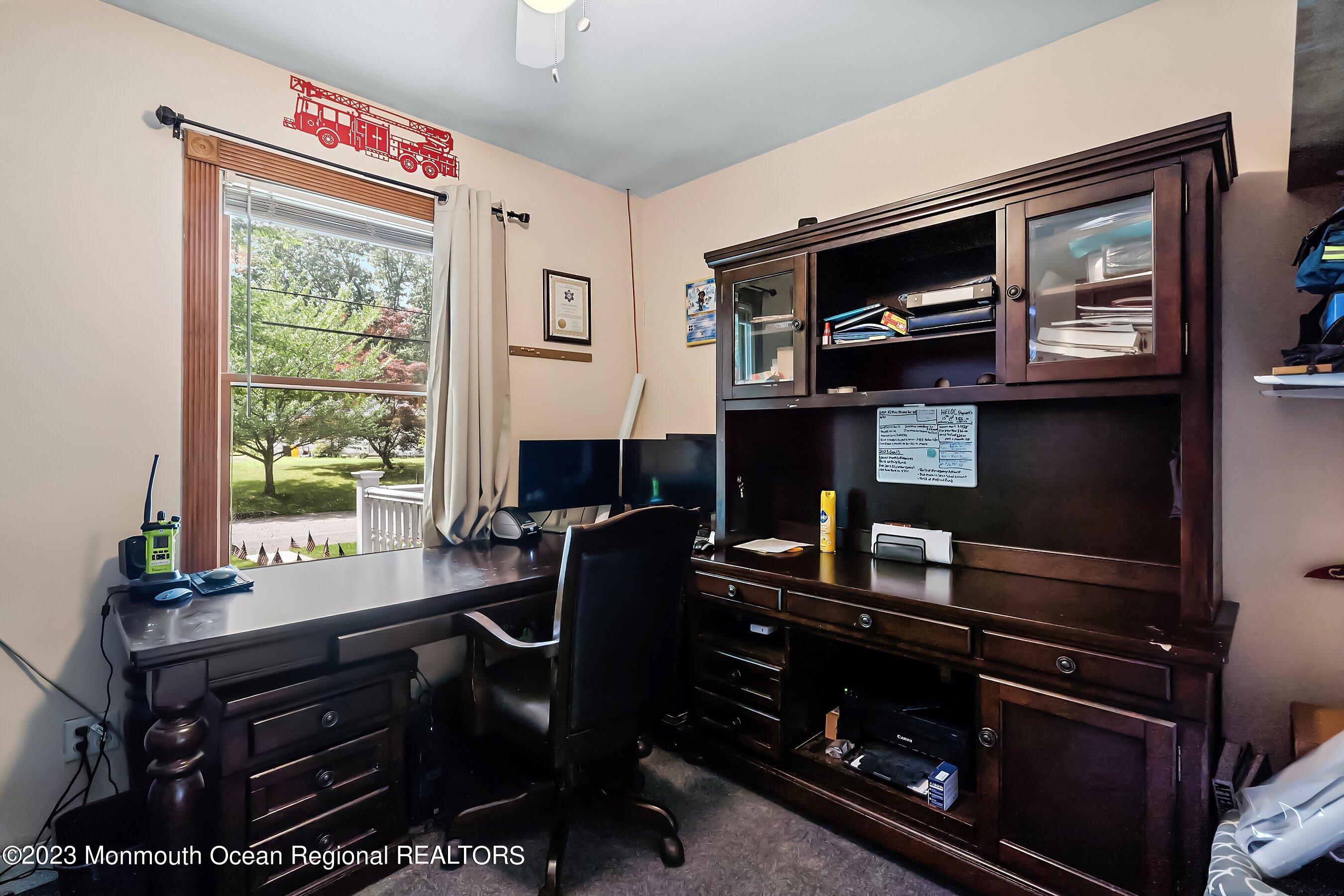 17 Murdock Place Jackson, NJ 08527 - Photo 23 of 34 a room with furniture and a flat screen tv