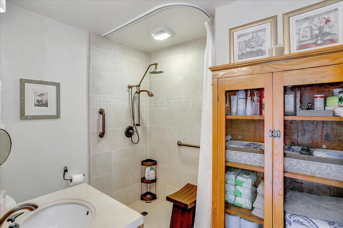 1130 Castro Street Mountain View, CA 94040 - Photo 23 of 37 a bathroom with a sink toilet and shower