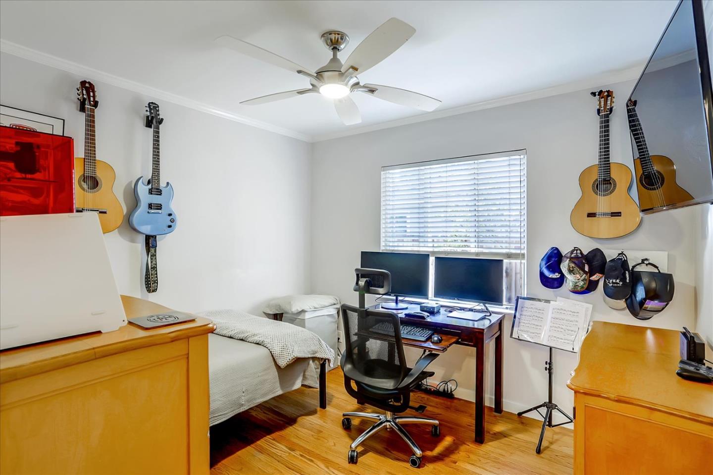 1130 Castro Street Mountain View, CA 94040 - Photo 24 of 37 a view of a workspace with furniture and a window