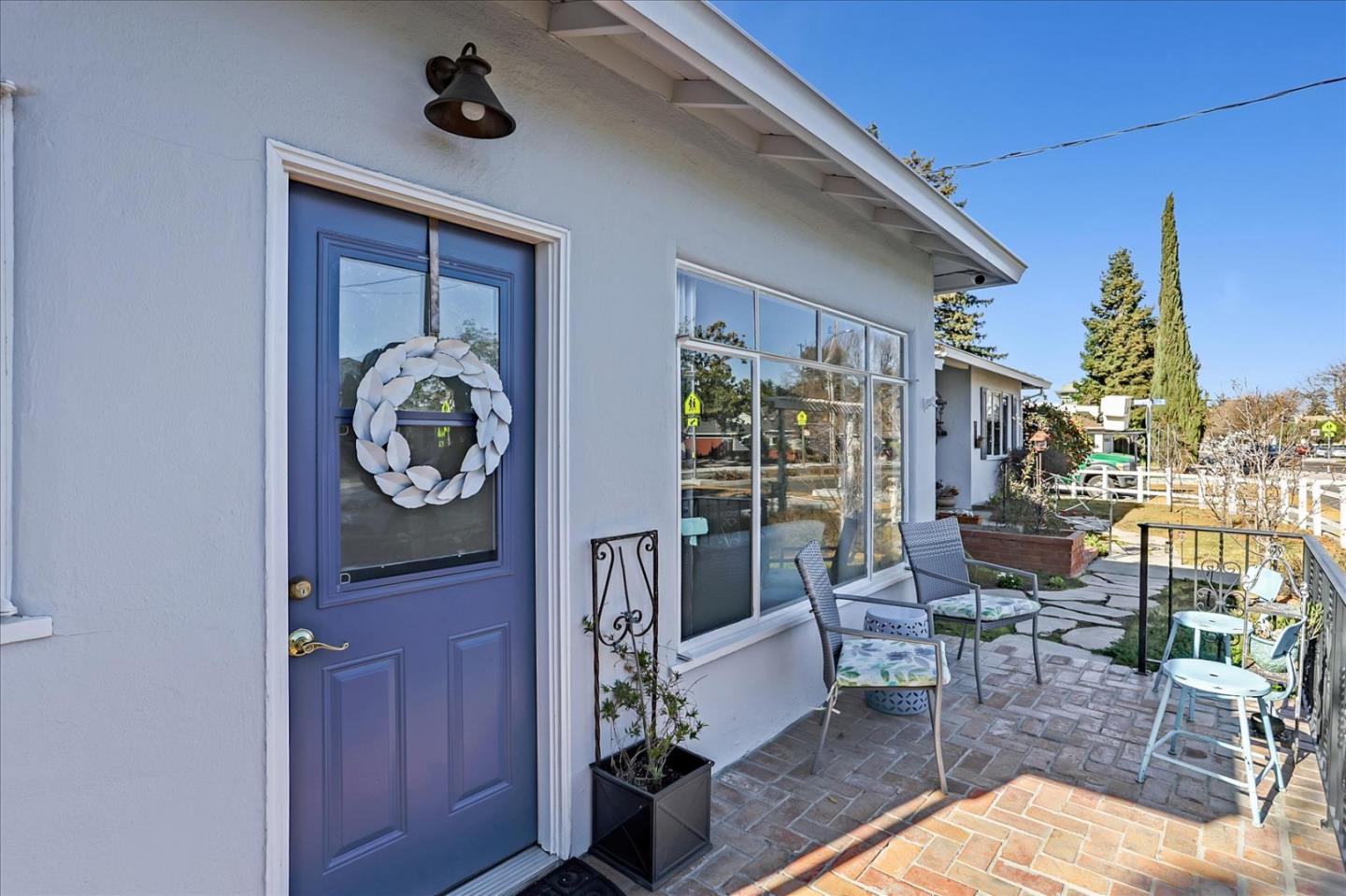 1130 Castro Street Mountain View, CA 94040 - Photo 27 of 37 a living room filled with furniture and a window