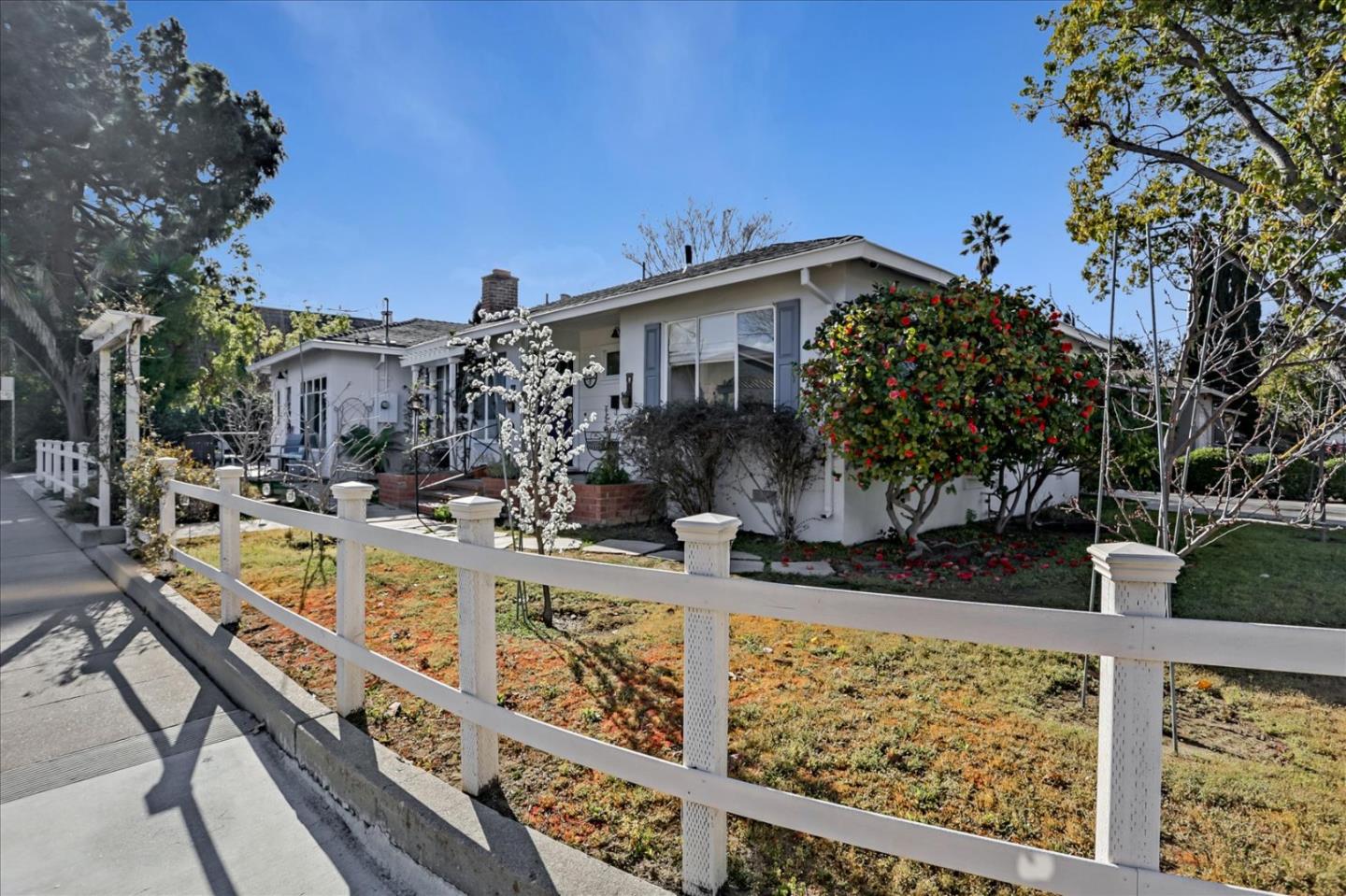 1130 Castro Street Mountain View, CA 94040 - Photo 3 of 37 a view of a swimming pool with a patio