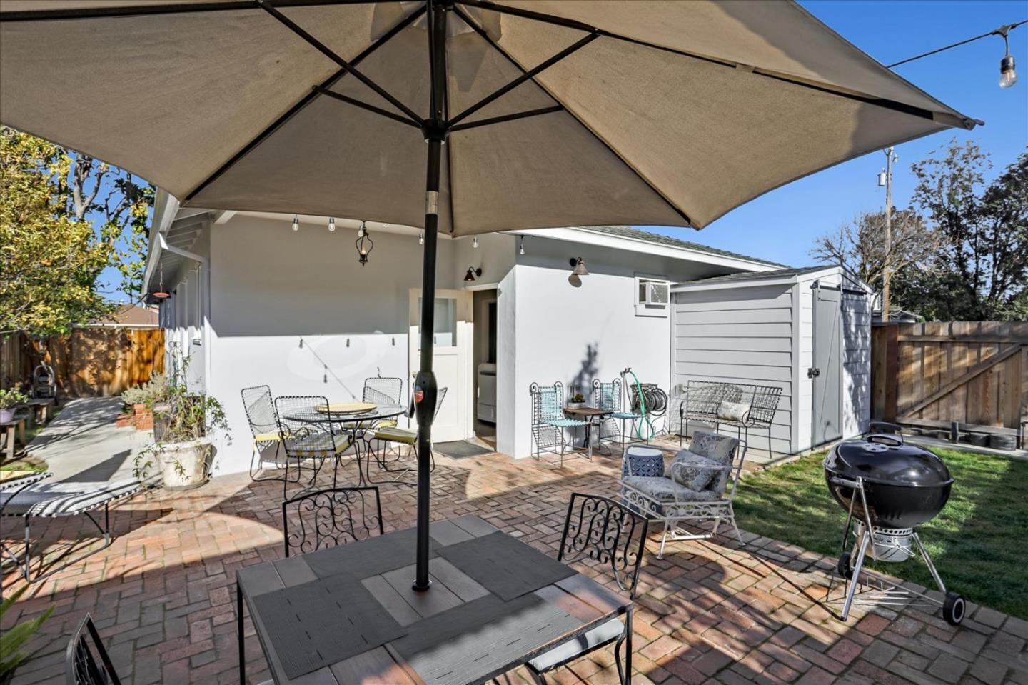 1130 Castro Street Mountain View, CA 94040 - Photo 31 of 37 a view of a patio with a table and chairs