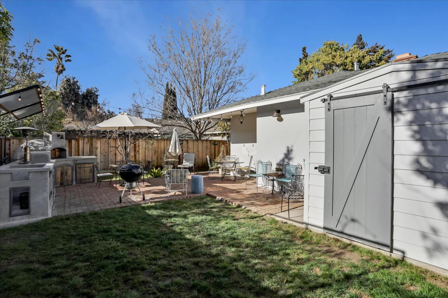 1130 Castro Street Mountain View, CA 94040 - Photo 32 of 37 a view of a backyard with a patio