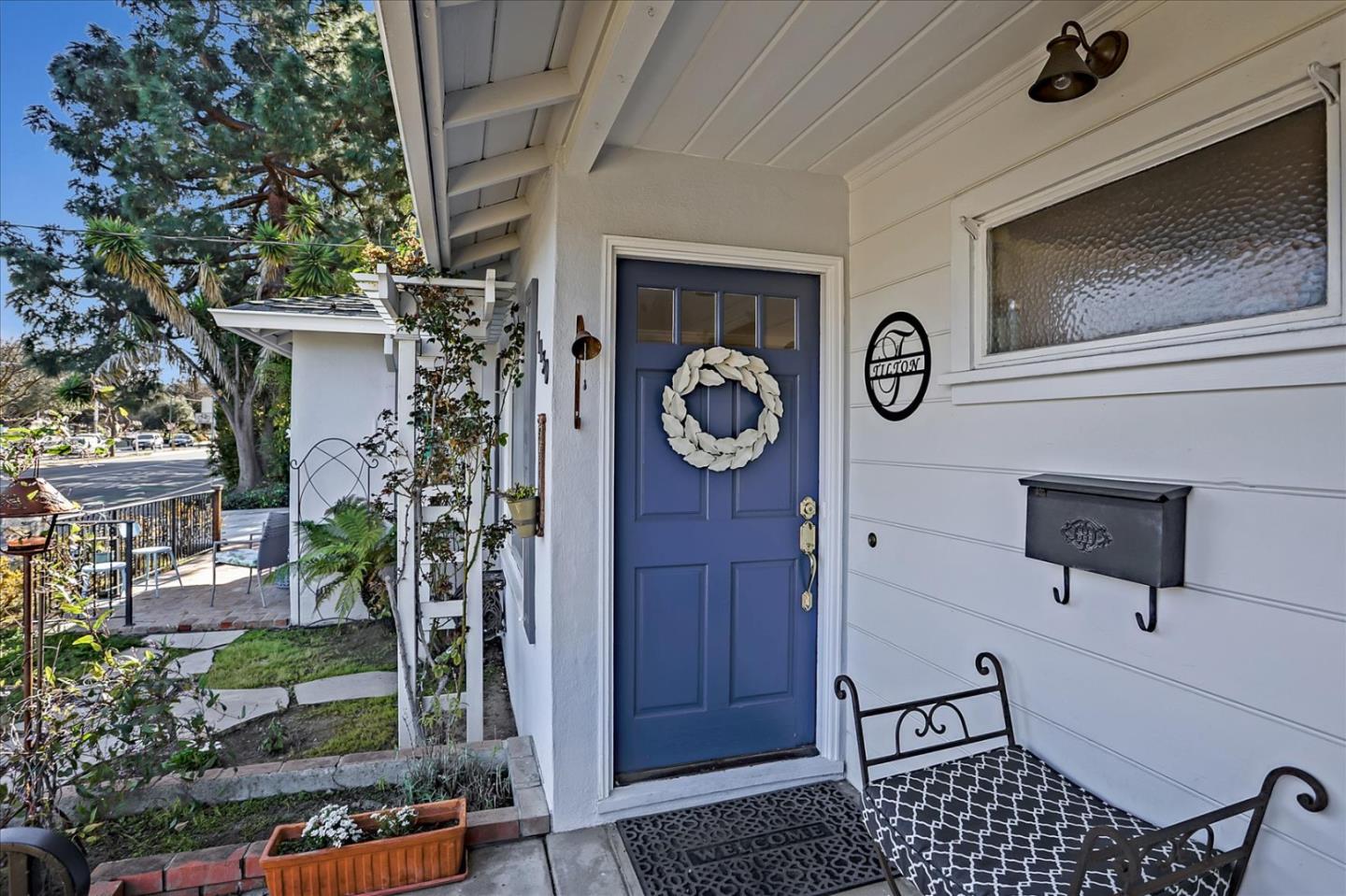 1130 Castro Street Mountain View, CA 94040 - Photo 6 of 37 a view of a door and a car parked in a room