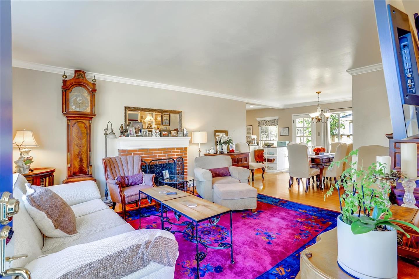 1130 Castro Street Mountain View, CA 94040 - Photo 7 of 37 a living room with furniture kitchen view and a large window