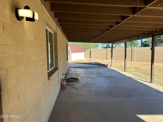 a view of a backyard of a house