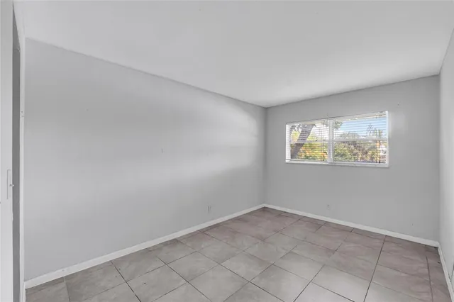 a bathroom with a sink vanity granite toilet tub and shower