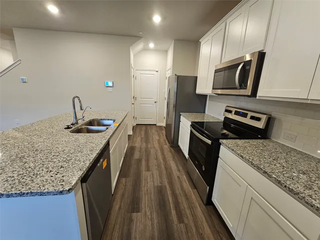 $229,000 | 164 Texas Agate Drive, Unit 4, Kyle, TX 78640