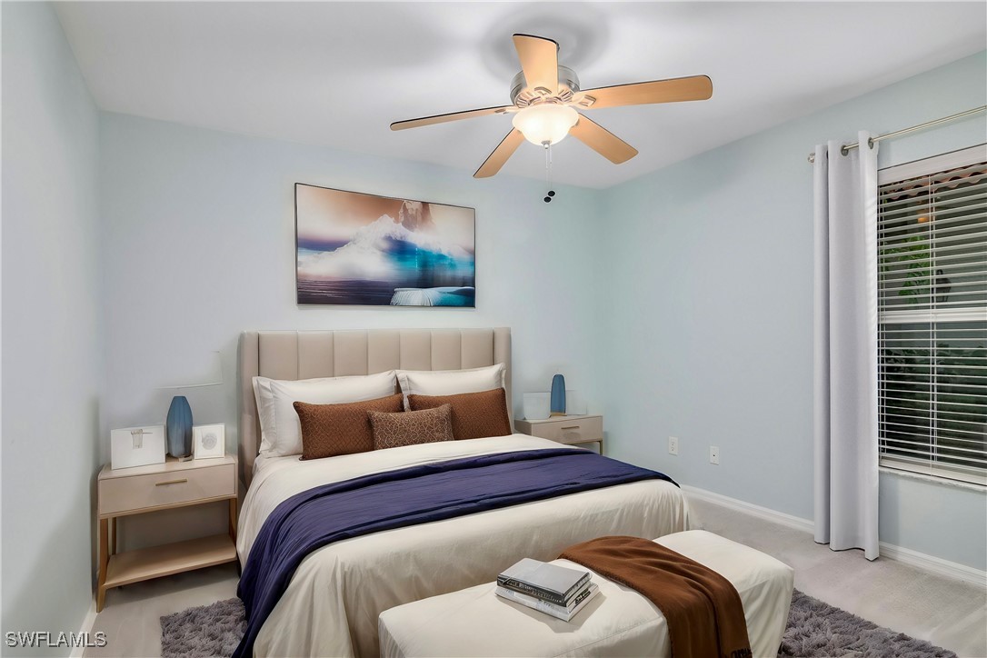 19642 Villa Rosa Loop Estero, FL 33967 - Photo 14 of 27 a bedroom with bed and a window