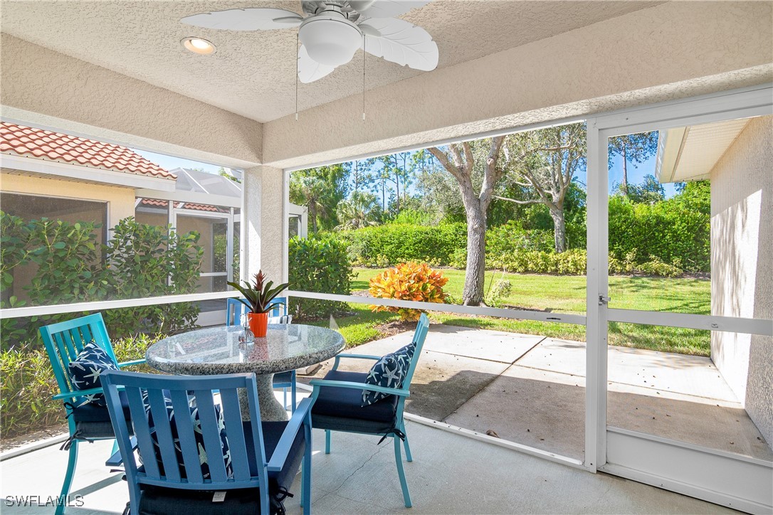 19642 Villa Rosa Loop Estero, FL 33967 - Photo 18 of 27 a view of a dining room with furniture window and outside view