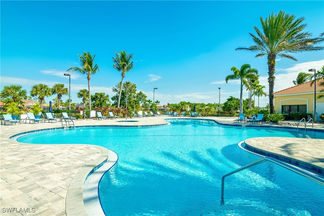 19642 Villa Rosa Loop Estero, FL 33967 - Photo 21 of 27 a view of a swimming pool and a chairs