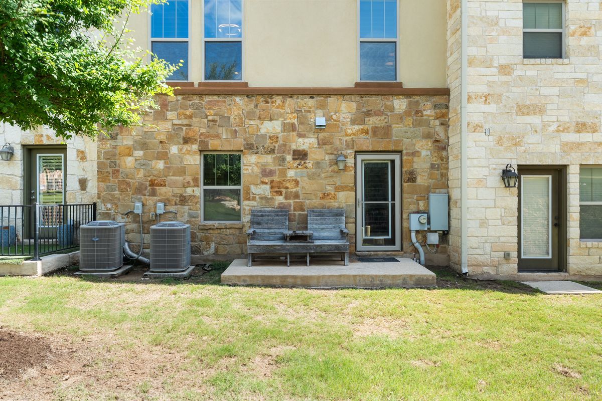 1116 Highknoll Lane Georgetown, TX 78628 - Photo 28 of 36 a front view of a house with a yard
