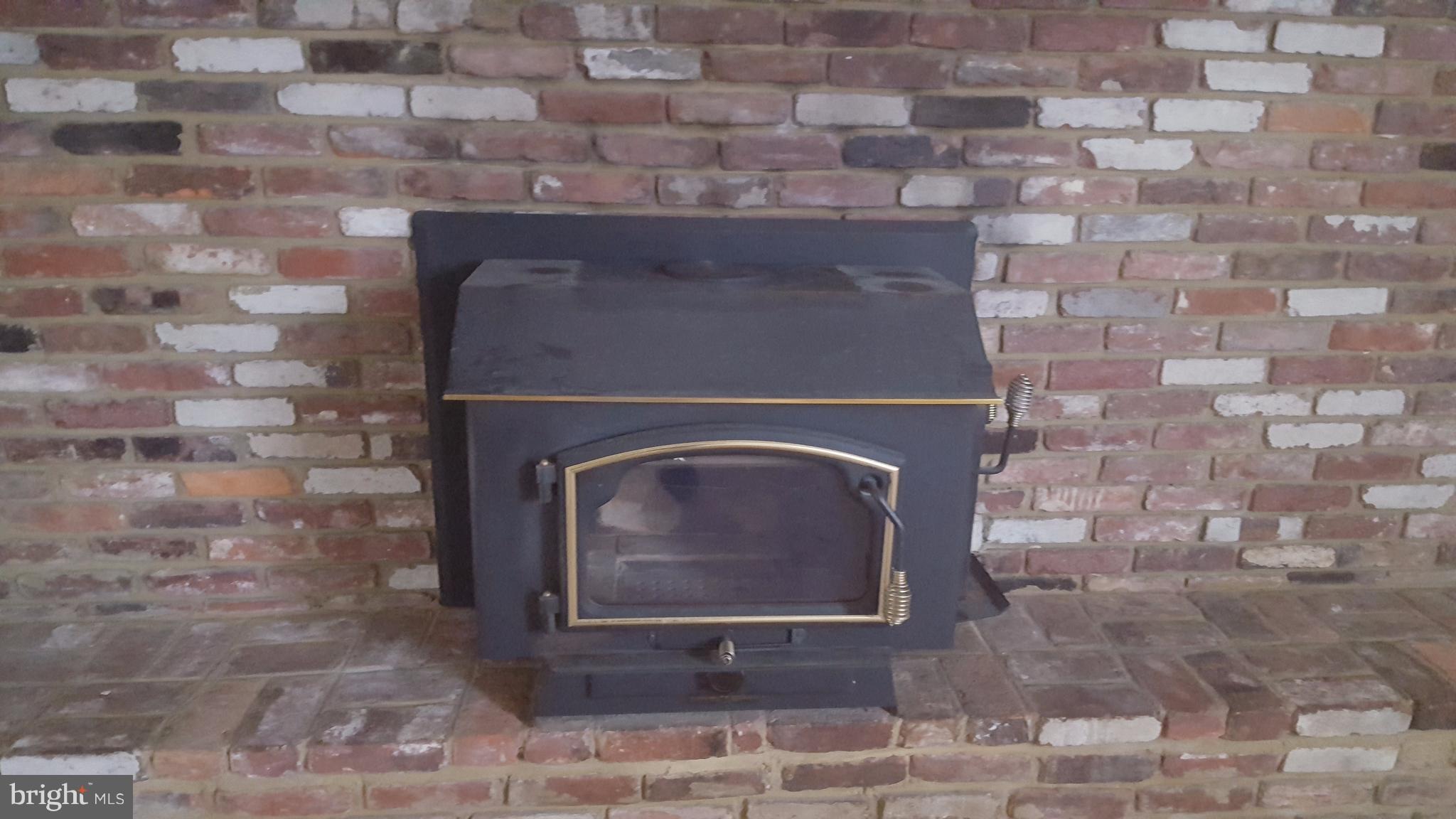 1642 Marlboro Road Edgewater, MD 21037 - Photo 17 of 27 a stone fireplace