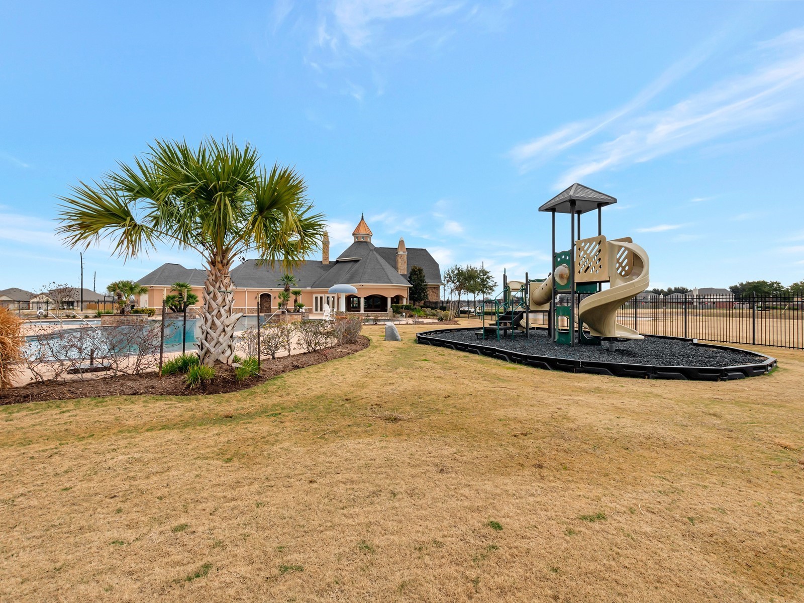 5714 Chamberlain Crossing Rosenberg, TX 77471 - Photo 11 of 16 a view of a house with a swimming pool
