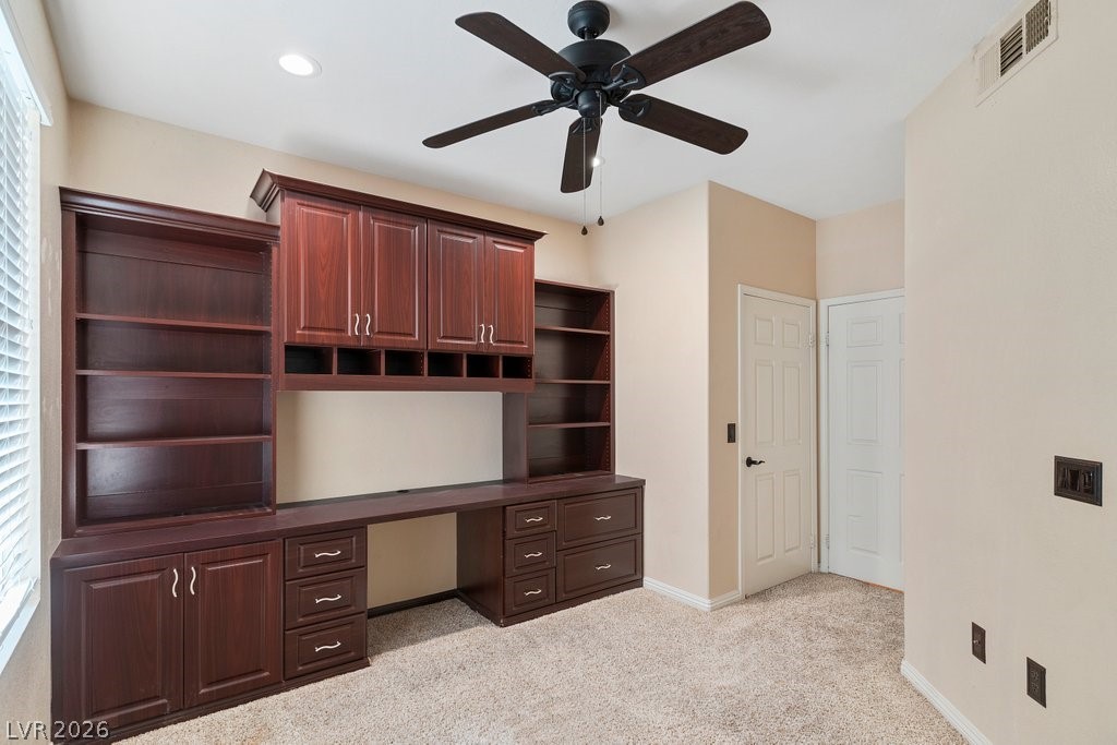 10001 Peace Way, Unit 2311 Las Vegas, NV 89147 - Photo 22 of 35 Unfurnished office with built in study area, a ceiling fan, and light carpet