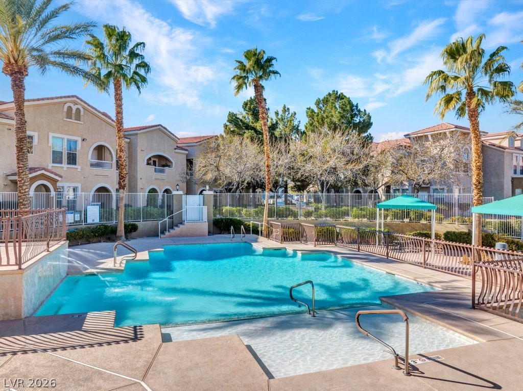 10001 Peace Way, Unit 2311 Las Vegas, NV 89147 - Photo 30 of 35 Community pool with a patio