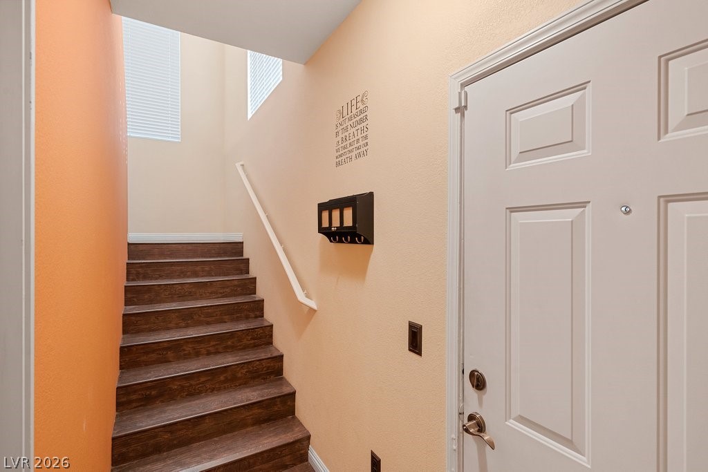 10001 Peace Way, Unit 2311 Las Vegas, NV 89147 - Photo 7 of 35 Stairs featuring baseboards