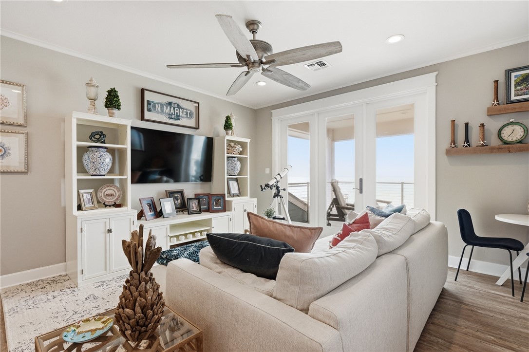 12 Sea Shell Shores Rockport, TX 78382 - Photo 23 of 40 a living room with furniture a flat screen tv and a window