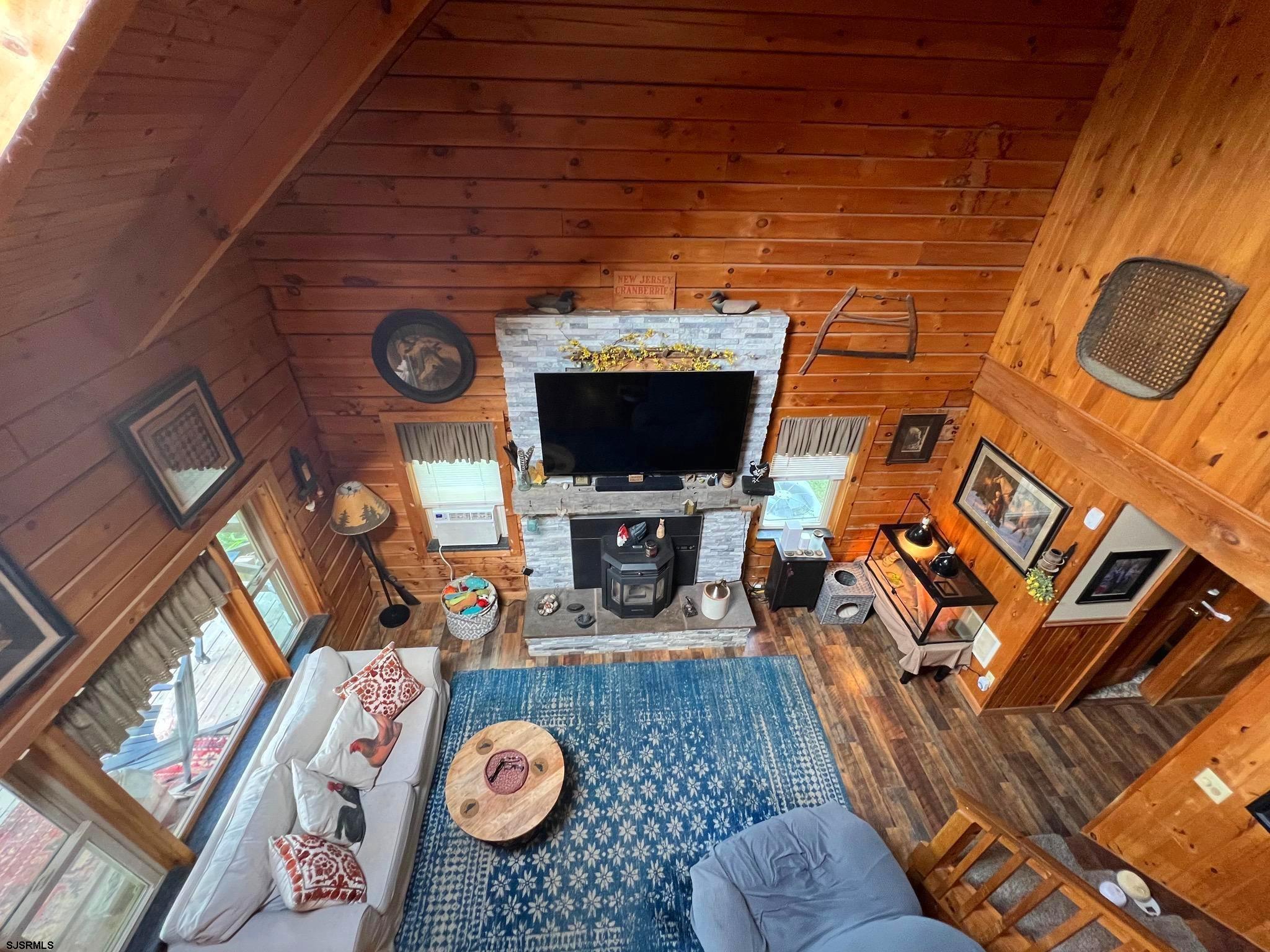 308 Willis Road Bridgeton, NJ 08302 - Photo 11 of 38 a living room with furniture and a fireplace