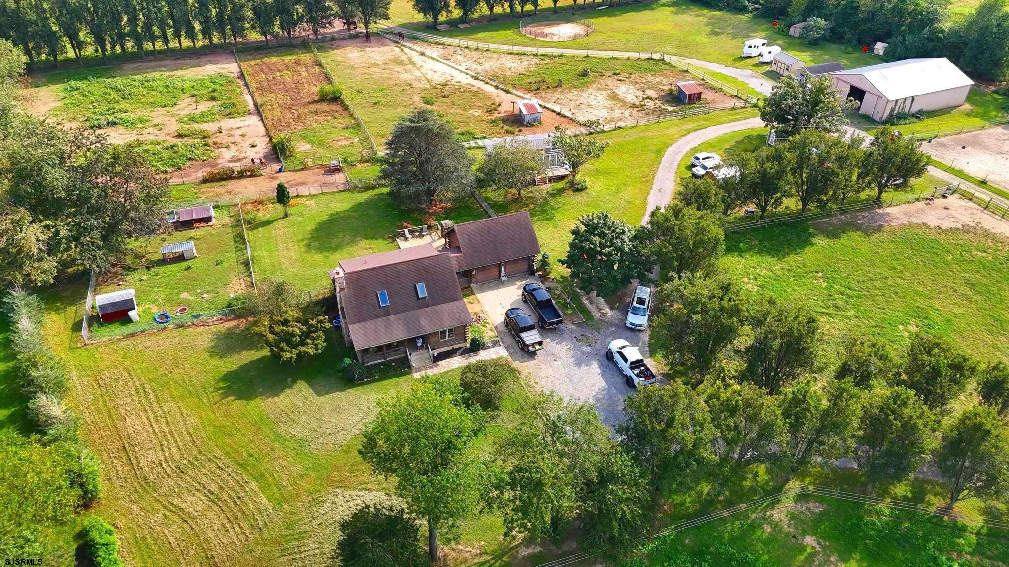 308 Willis Road Bridgeton, NJ 08302 - Photo 7 of 38 an aerial view of residential houses with swimming pool and outdoor space