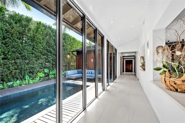 a bedroom with a bed and a chair