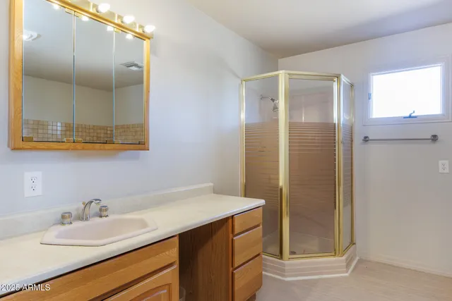 a bathroom with a sink a toilet and bathtub
