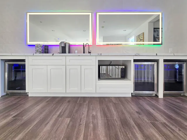 a bathroom with a bathtub and shower