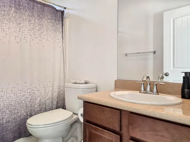 a view of hallway with windows