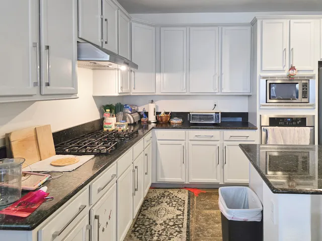 a room with toys and storage cabinet