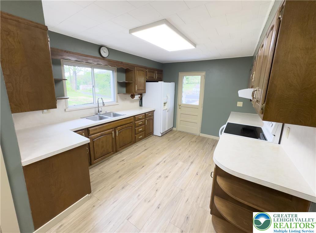 67 Long Run Road Lehighton, PA 18235 - Photo 2 of 23 a kitchen with a sink and wooden floor