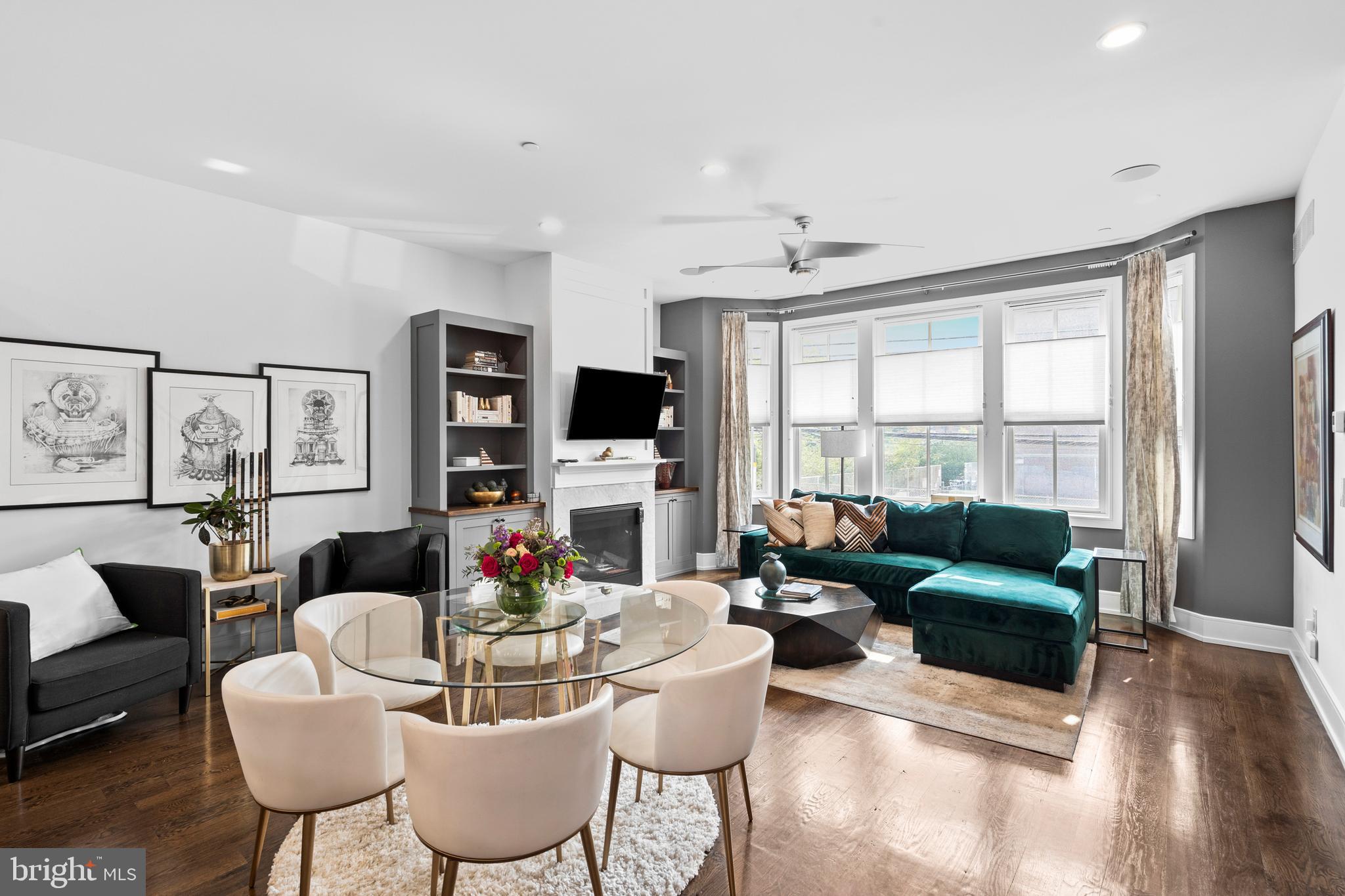 606 North 16th Street Philadelphia, PA 19130 - Photo 16 of 43 a living room with fireplace furniture and a flat screen tv