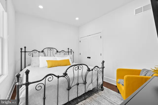 a bathroom with a bathtub and window