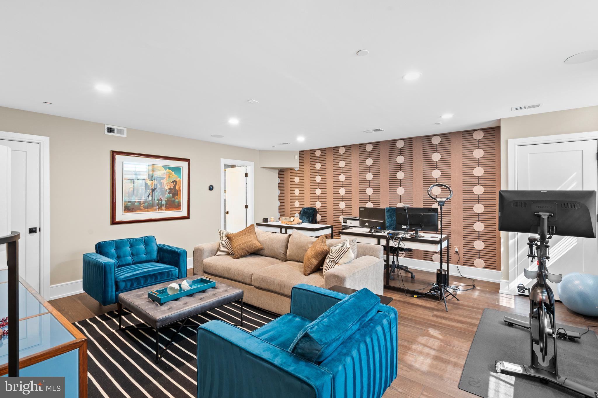 606 North 16th Street Philadelphia, PA 19130 - Photo 32 of 43 a living room with furniture and a flat screen tv