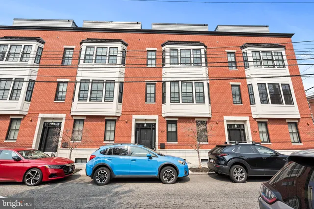 a car parked in front of a building