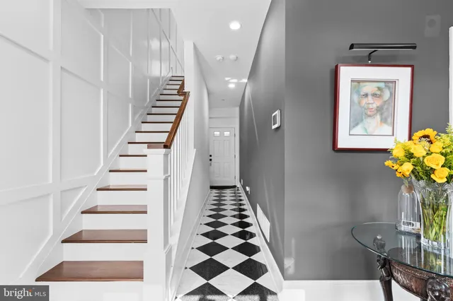 a view of entryway with wooden floor